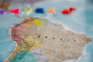 Detailed close-up map of South America highlighting Brazil with a yellow flag pin.